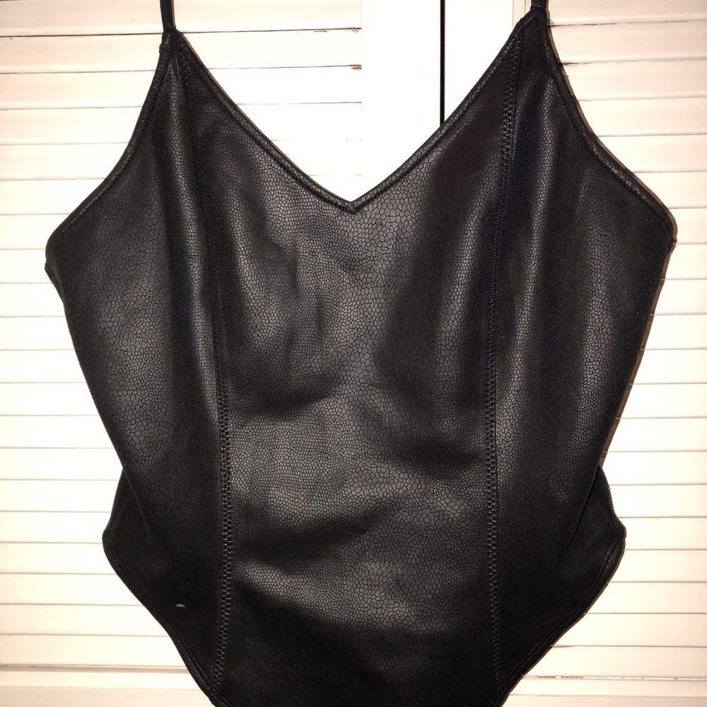 *never worn* black body suit.